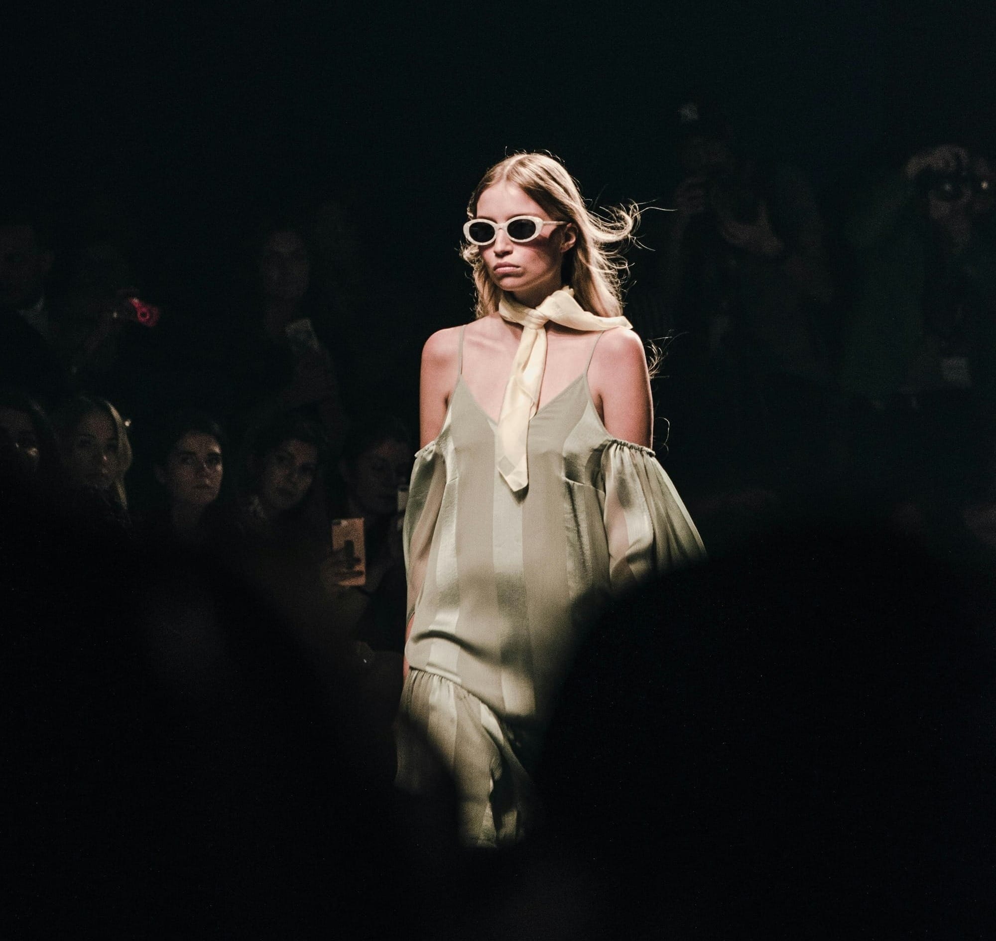 woman in white dress wearing sunglasses